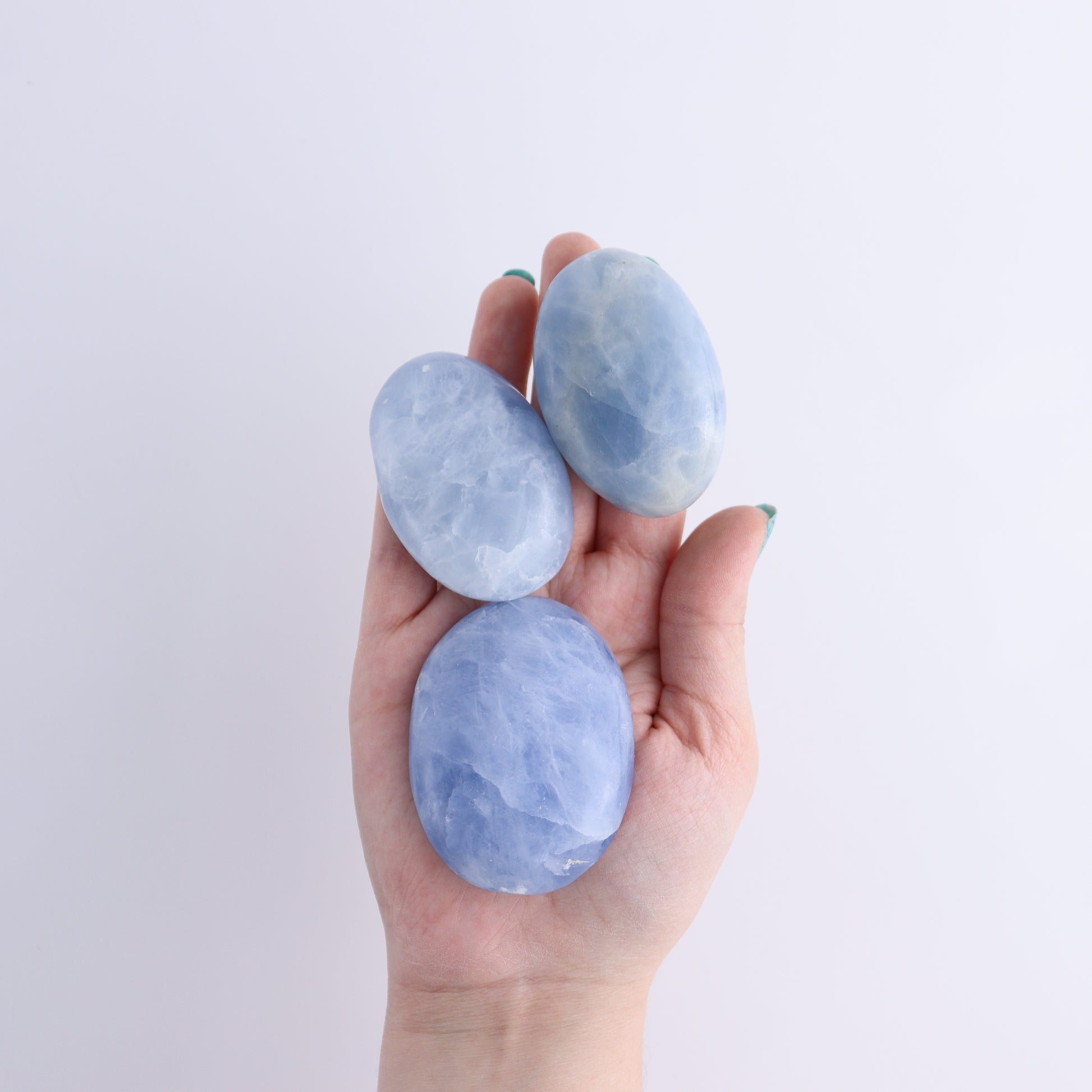 Blue Calcite Palm Stones 1 kg Set - Expert Wholesale and Supplier of Wholesale Crystals & Bulk Gemstones, ["Blue Calcite","Calcite","Madagascar","Palm Stones"]