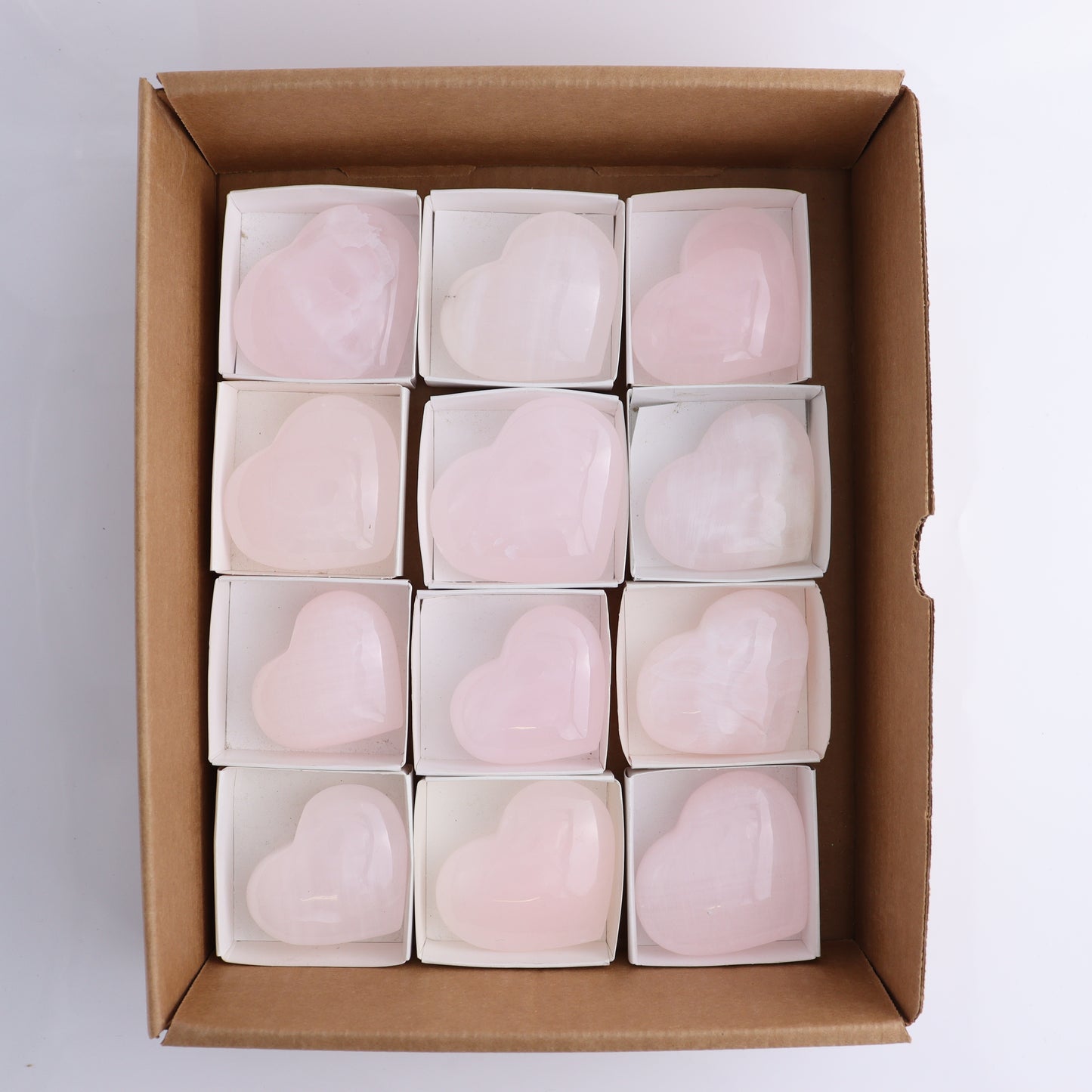 Mangano Calcite Hearts Flat of 12 - Expert Wholesale and Supplier of Wholesale Crystals & Bulk Gemstones, ["close_30","Pakistan","Pink Calcite"]