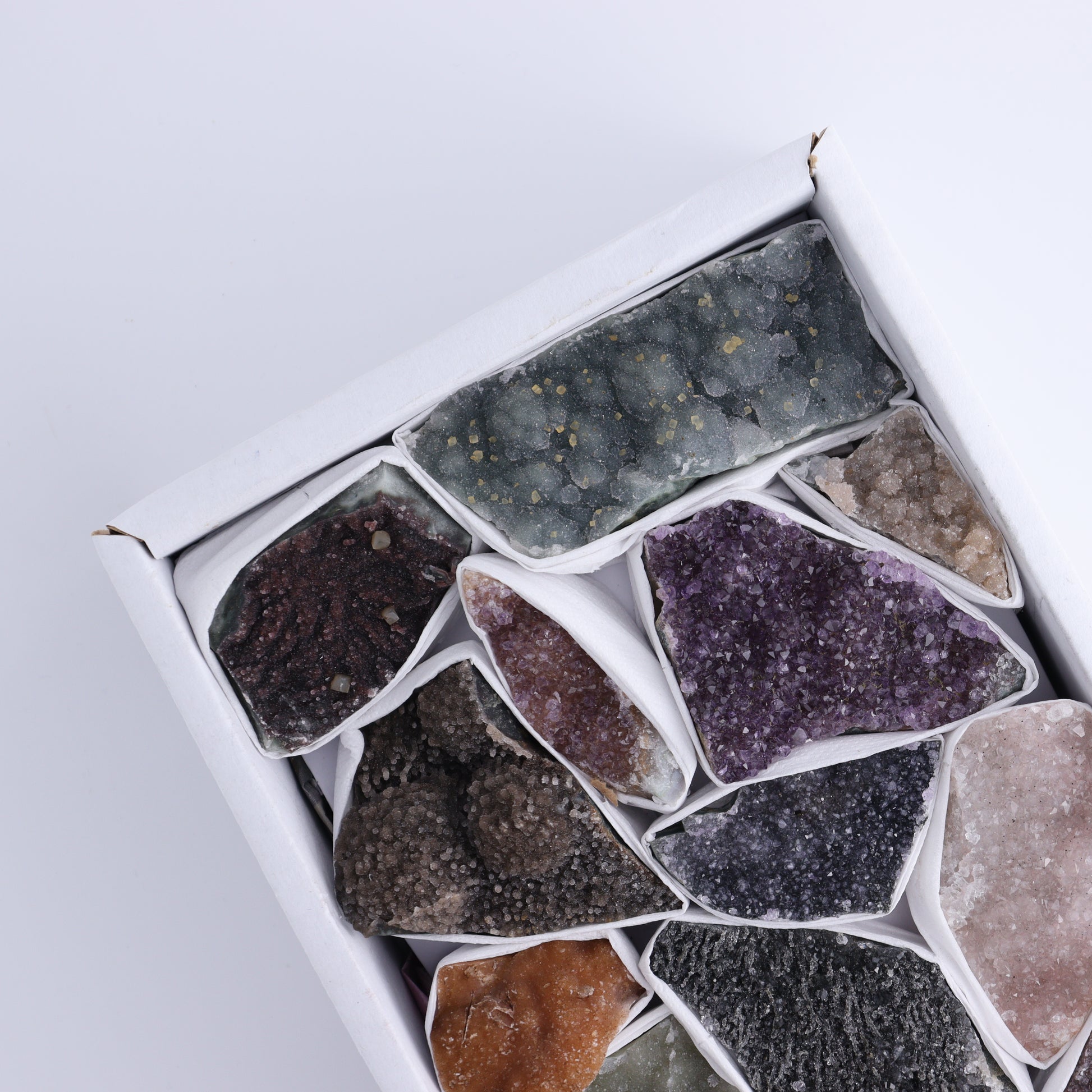 Uruguay Rainbow Amethyst Clusters Flat of 13 - Expert Wholesale and Supplier of Wholesale Crystals & Bulk Gemstones, ["Amethyst","Clusters","Rainbow Amethyst","Sugar Rainbow Amethyst","Uruguay"]
