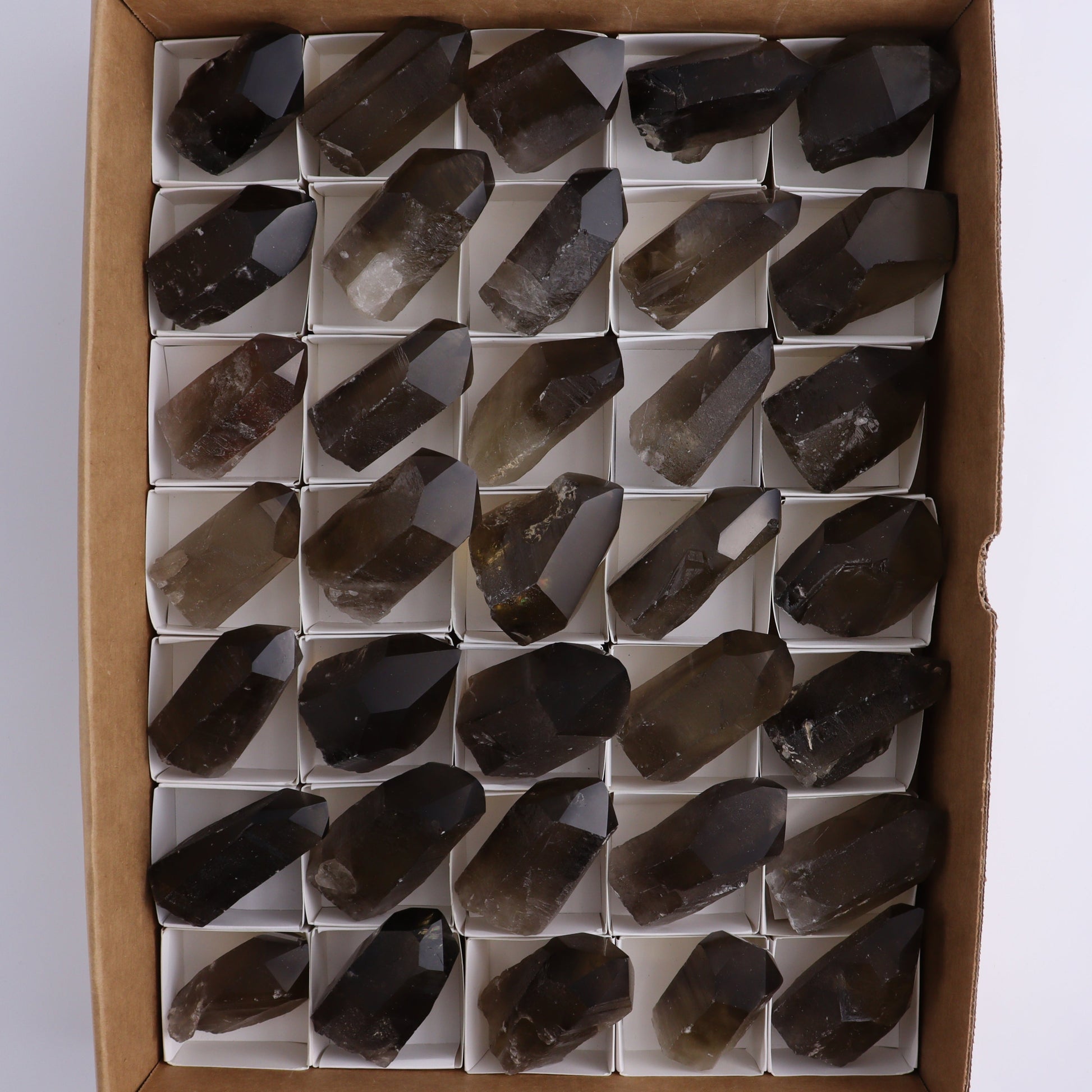 Smoky Quartz Polished Tops Set of 35 - Expert Wholesale and Supplier of Wholesale Crystals & Bulk Gemstones, ["Brazil","close_70","Points","Quartz","Smoky Quartz"]