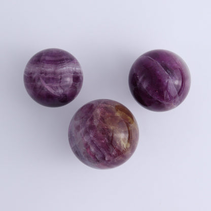Purple Fluorite Spheres Set of 9 - Expert Wholesale and Supplier of Wholesale Crystals & Bulk Gemstones, ["Fluorite","Purple Fluorite","Spheres"]