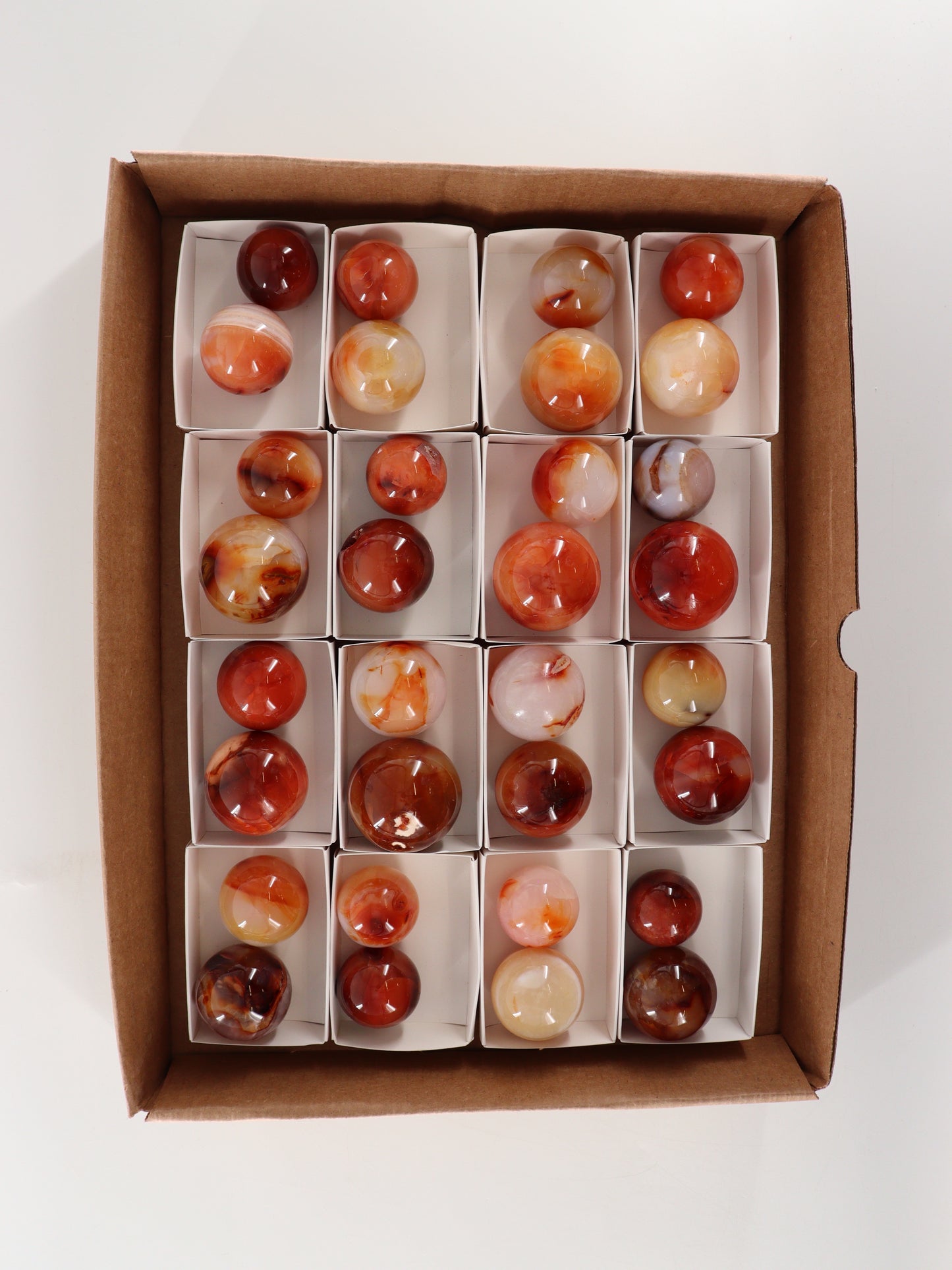 Carnelian Spheres Set of 32 - Expert Wholesale and Supplier of Wholesale Crystals & Bulk Gemstones, []
