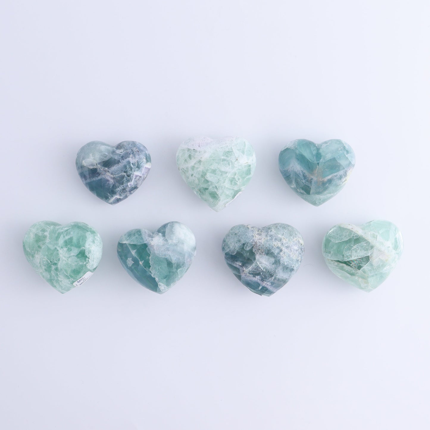 Fluorite Hearts Set of 7 - Expert Wholesale and Supplier of Wholesale Crystals & Bulk Gemstones, ["Fluorite","Hearts","Mexico"]