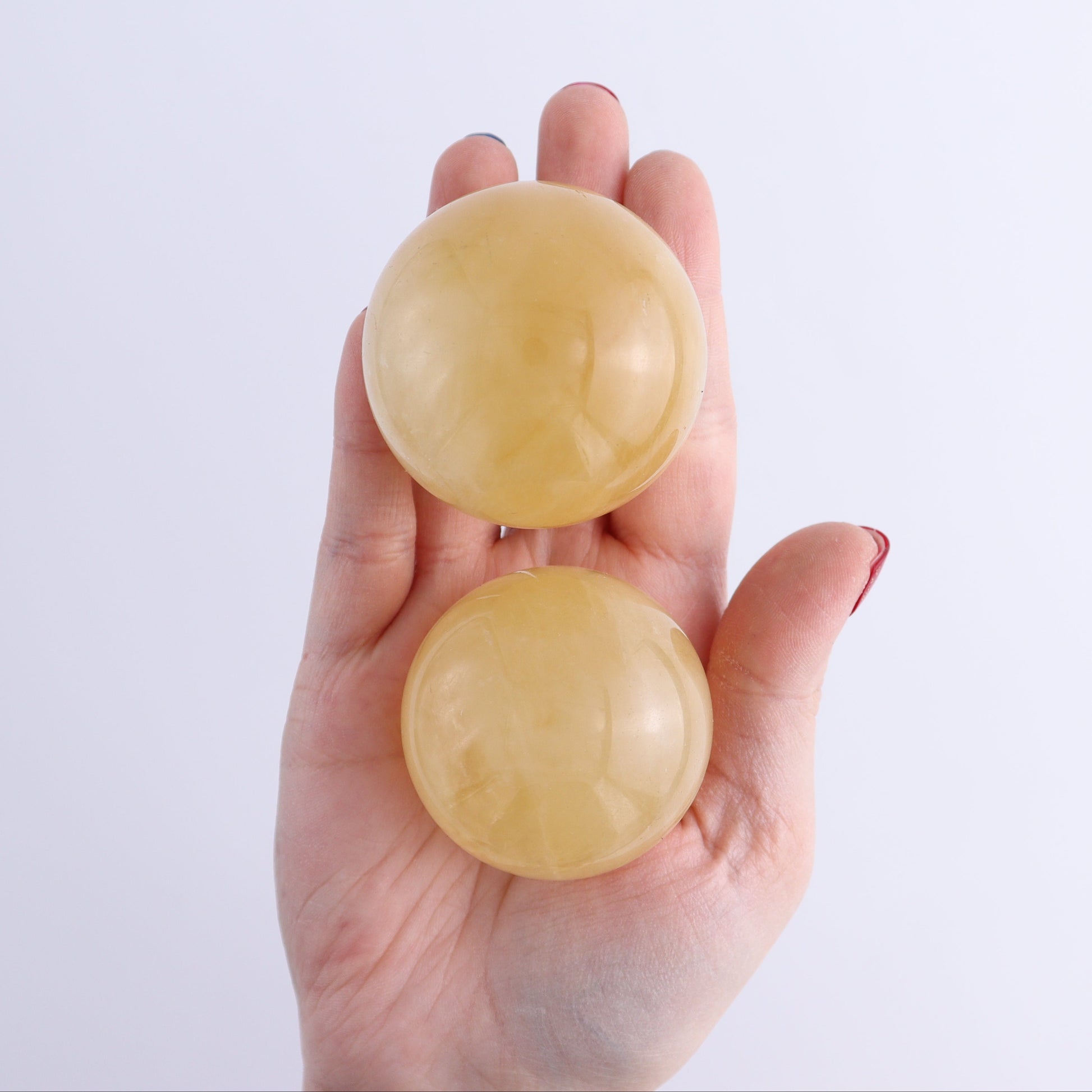 Calcite Spheres Set of 9 - Expert Wholesale and Supplier of Wholesale Crystals & Bulk Gemstones, ["Calcite","Mexico","Spheres"]