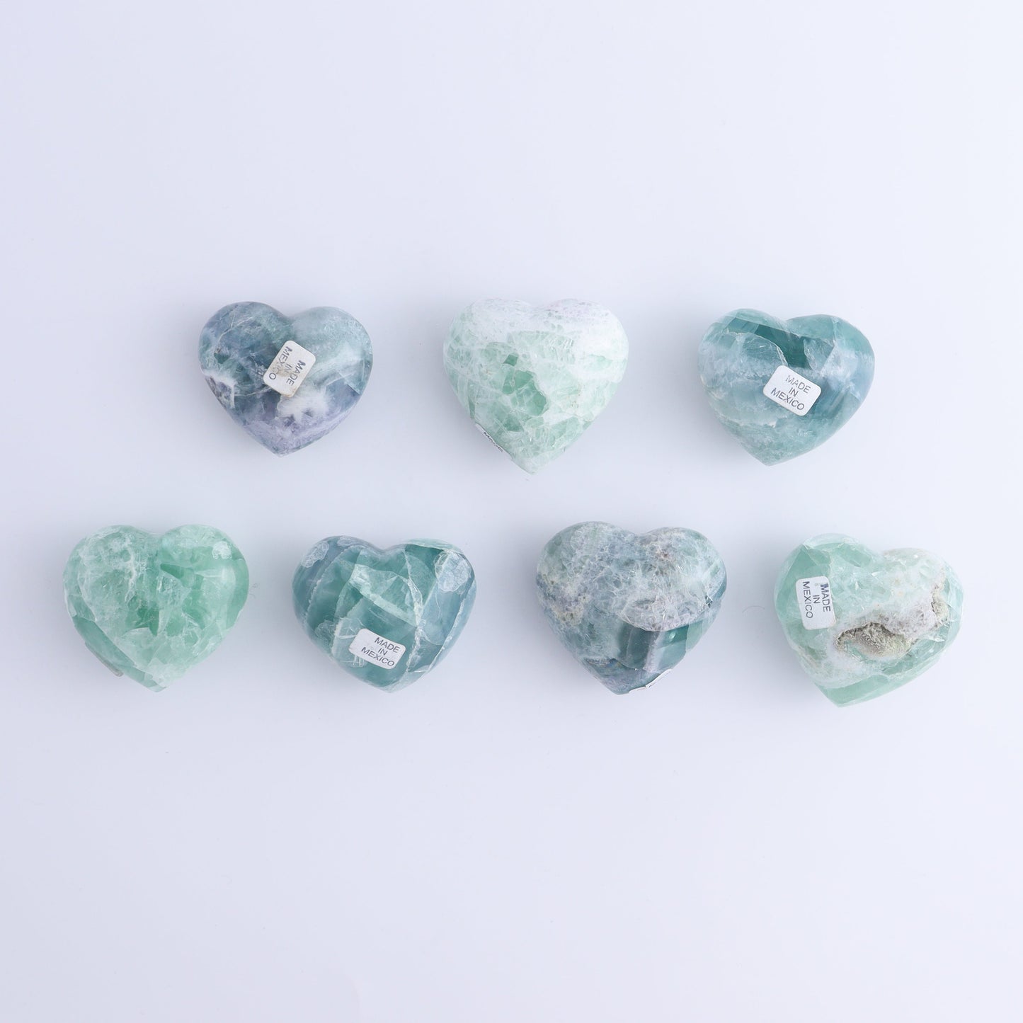 Fluorite Hearts Set of 7 - Expert Wholesale and Supplier of Wholesale Crystals & Bulk Gemstones, ["Fluorite","Hearts","Mexico"]
