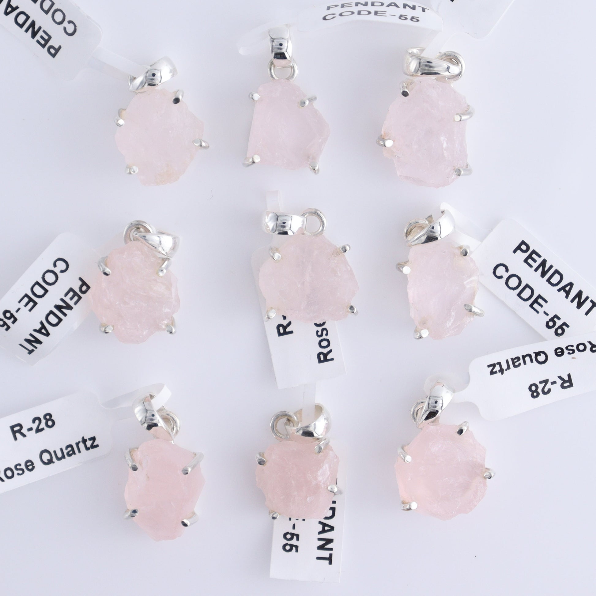 One Rose Quartz Rough Sterling Silver Pendant (chain not included) - Expert Wholesale and Supplier of Wholesale Crystals & Bulk Gemstones, ["Pendant","Rose Quartz","Sterling Silver"]