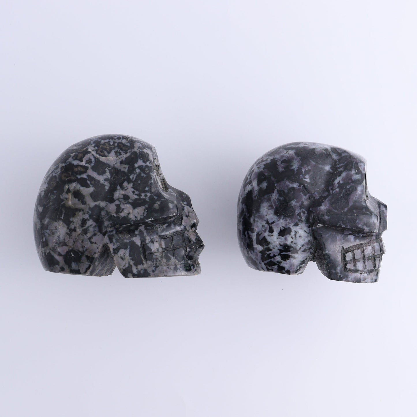 Indigo Gabbro Skulls Set of 2 - Expert Wholesale and Supplier of Wholesale Crystals & Bulk Gemstones, ["Indigo Gabbro","Madagascar","Skulls"]