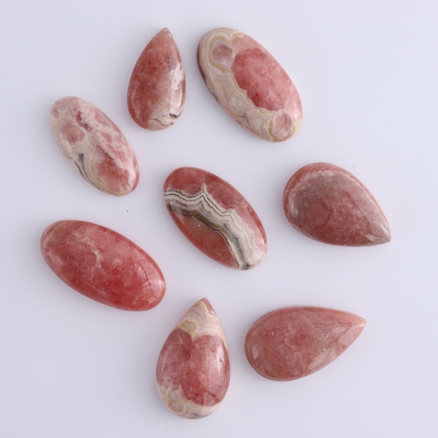 Rhodochrosite Cabs Set of 8 - Expert Wholesale and Supplier of Wholesale Crystals & Bulk Gemstones, ["Argentina","Cabs","Oval","Rhodochrosite"]