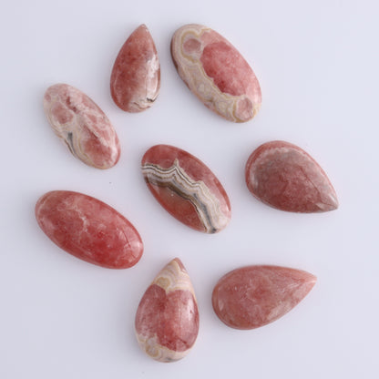 Rhodochrosite Cabs Set of 8 - Expert Wholesale and Supplier of Wholesale Crystals & Bulk Gemstones, ["Argentina","Cabs","Oval","Rhodochrosite"]