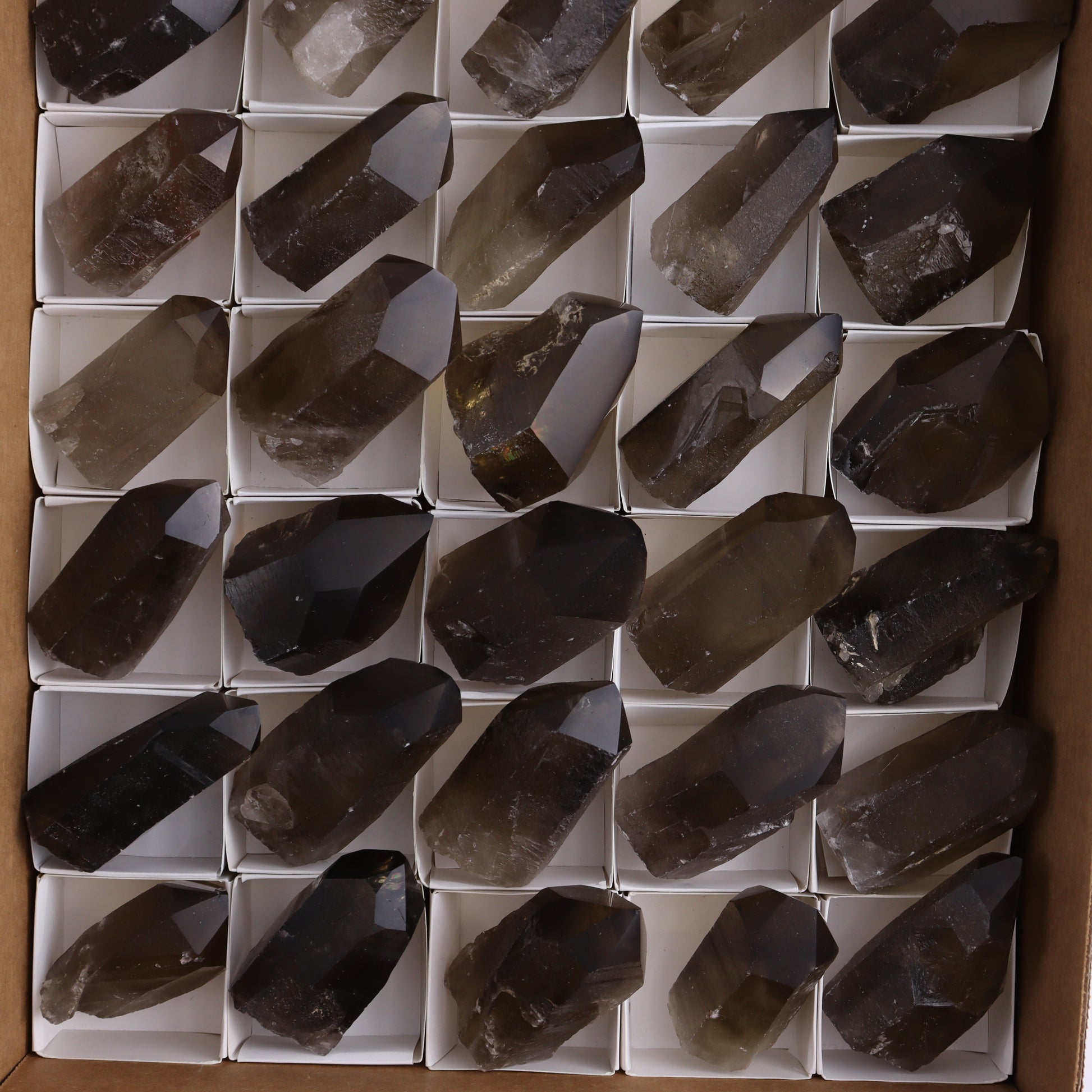 Smoky Quartz Polished Tops Set of 35 - Expert Wholesale and Supplier of Wholesale Crystals & Bulk Gemstones, ["Brazil","close_70","Points","Quartz","Smoky Quartz"]