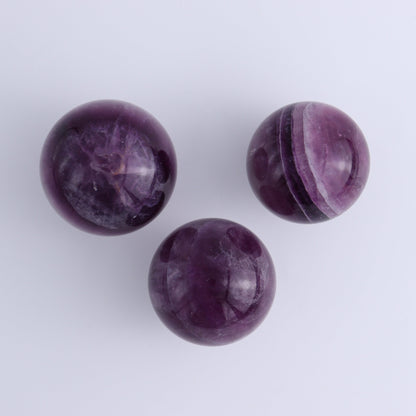 Purple Fluorite Spheres Set of 9 - Expert Wholesale and Supplier of Wholesale Crystals & Bulk Gemstones, ["Fluorite","Purple Fluorite","Spheres"]