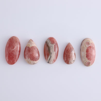 Rhodochrosite Cabs Set of 8 - Expert Wholesale and Supplier of Wholesale Crystals & Bulk Gemstones, ["Argentina","Cabs","Oval","Rhodochrosite"]