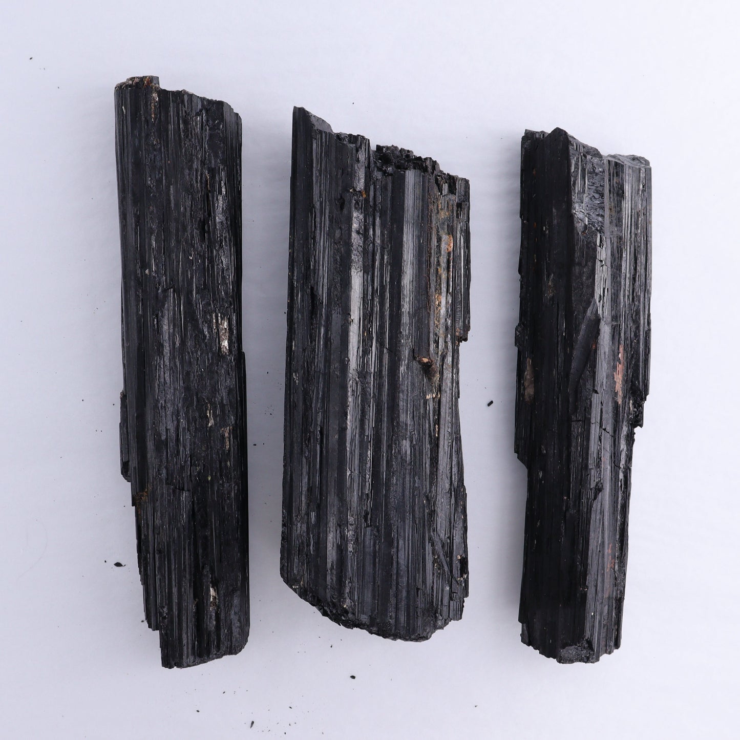 Black Tourmaline Log Set of 3 - Expert Wholesale and Supplier of Wholesale Crystals & Bulk Gemstones, ["Black Tourmaline","logs","Madagascar","Rough","Tourmaline"]