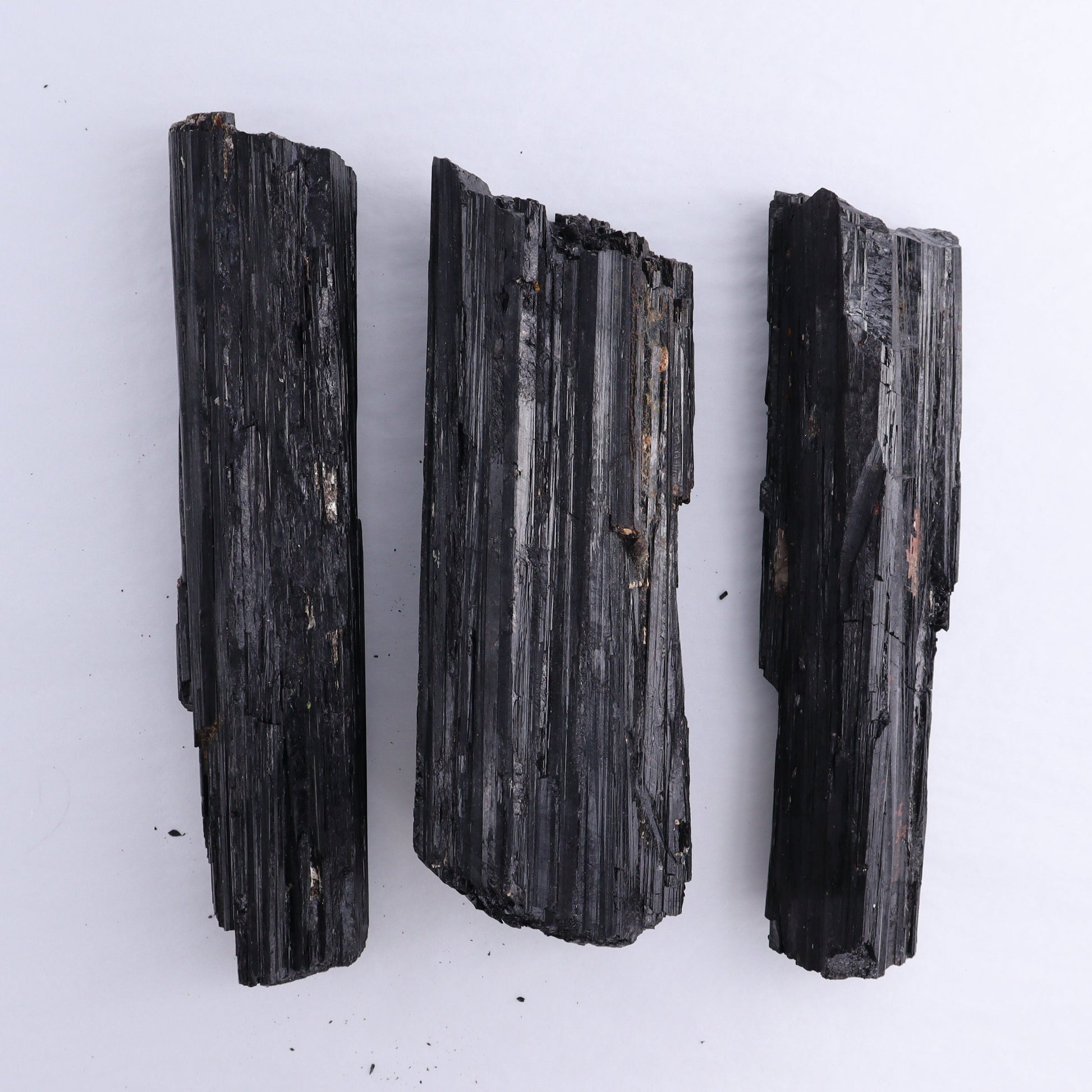 Black Tourmaline Log Set of 3 - Expert Wholesale and Supplier of Wholesale Crystals & Bulk Gemstones, ["Black Tourmaline","logs","Madagascar","Rough","Tourmaline"]