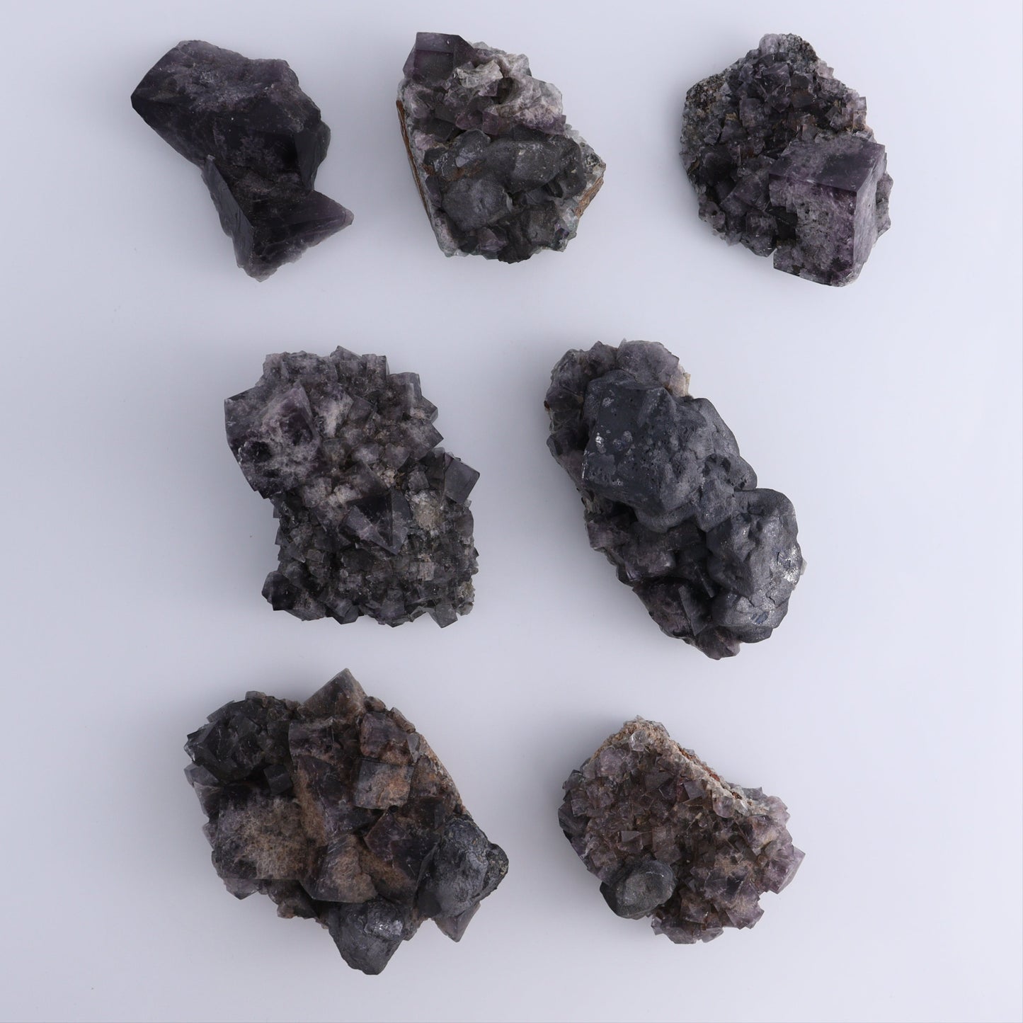 Fluorite Purple Rain Pocket Set of 7 - Expert Wholesale and Supplier of Wholesale Crystals & Bulk Gemstones, ["close_50","England","Fluorite","Purple Rain Pocket","Rough"]