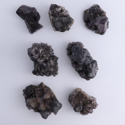 Fluorite Purple Rain Pocket Set of 7 - Expert Wholesale and Supplier of Wholesale Crystals & Bulk Gemstones, ["close_50","England","Fluorite","Purple Rain Pocket","Rough"]