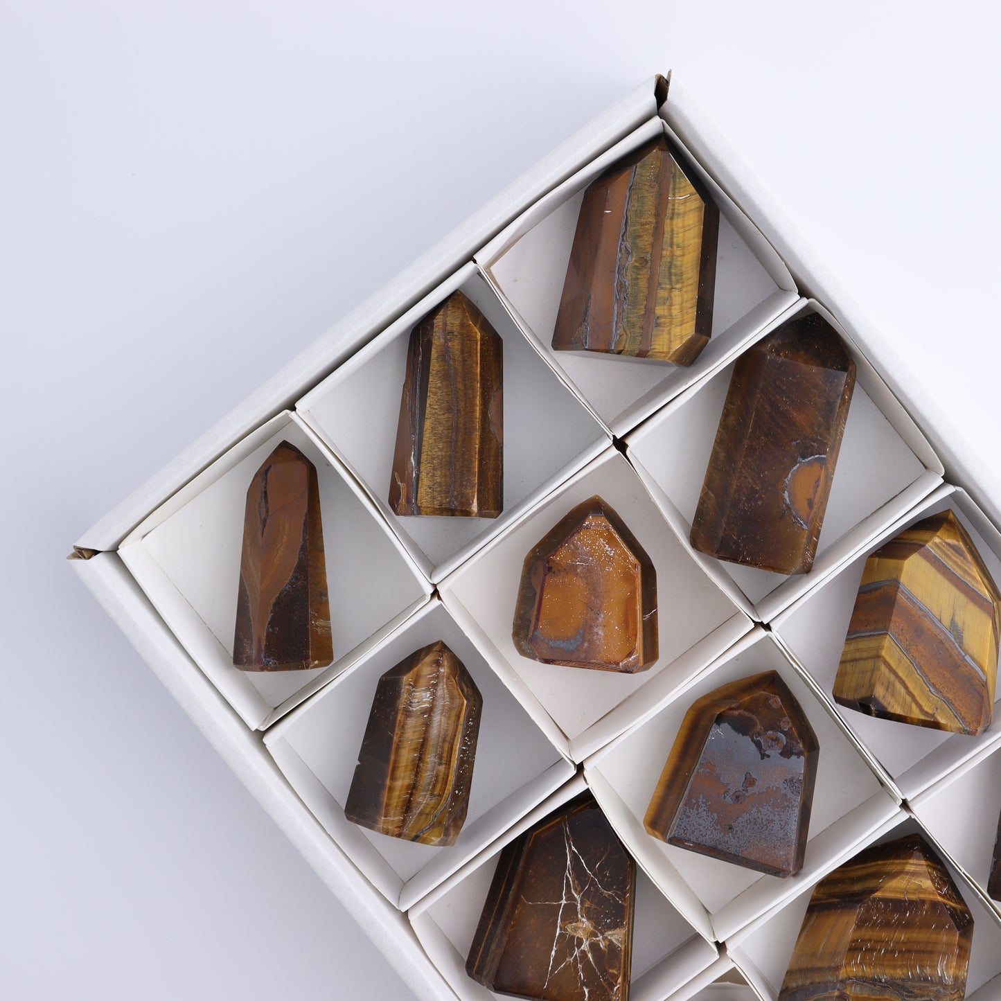 Tiger Eye Towers Set of 12 - Expert Wholesale and Supplier of Wholesale Crystals & Bulk Gemstones, ["Brazil","close_70","Tiger Eye","Towers"]