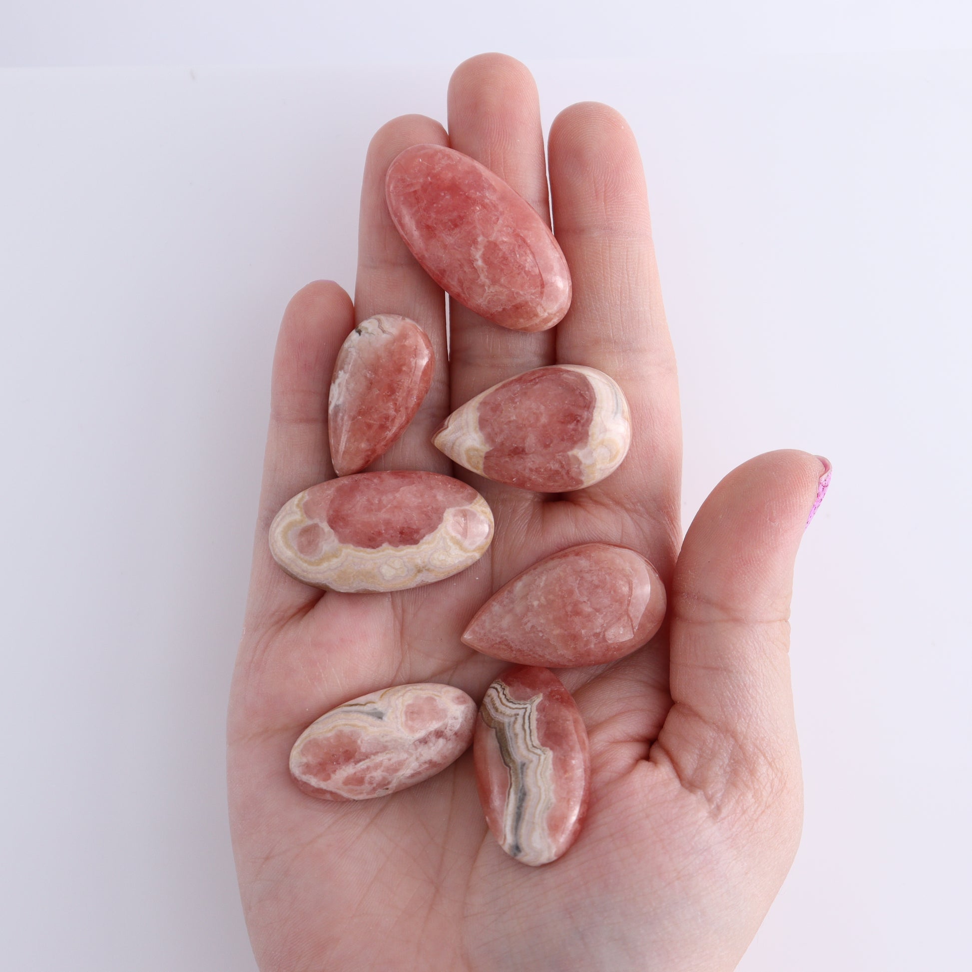 Rhodochrosite Cabs Set of 8 - Expert Wholesale and Supplier of Wholesale Crystals & Bulk Gemstones, ["Argentina","Cabs","Oval","Rhodochrosite"]