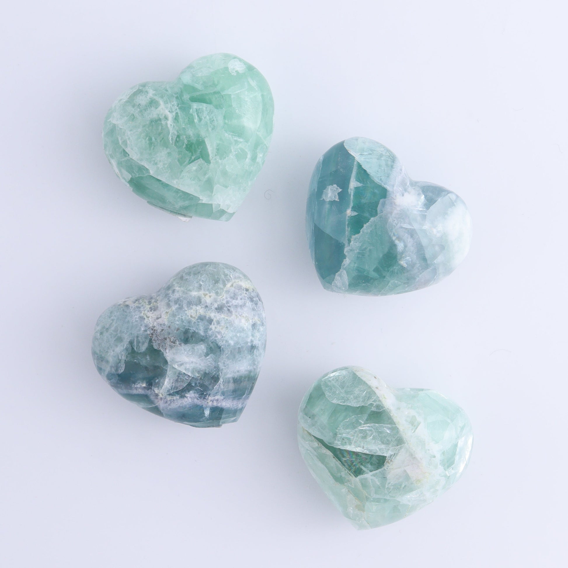 Fluorite Hearts Set of 7 - Expert Wholesale and Supplier of Wholesale Crystals & Bulk Gemstones, ["Fluorite","Hearts","Mexico"]