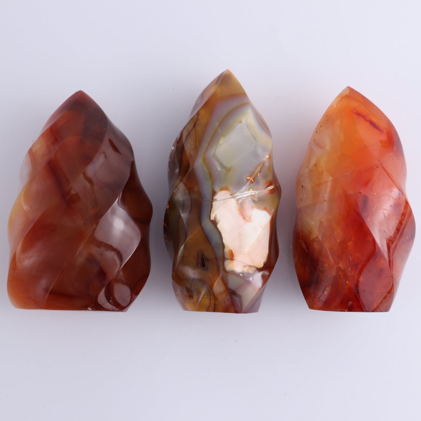 Carnelian Flames Set of 7 - Expert Wholesale and Supplier of Wholesale Crystals & Bulk Gemstones, ["carnelian","flames","Madagascar"]