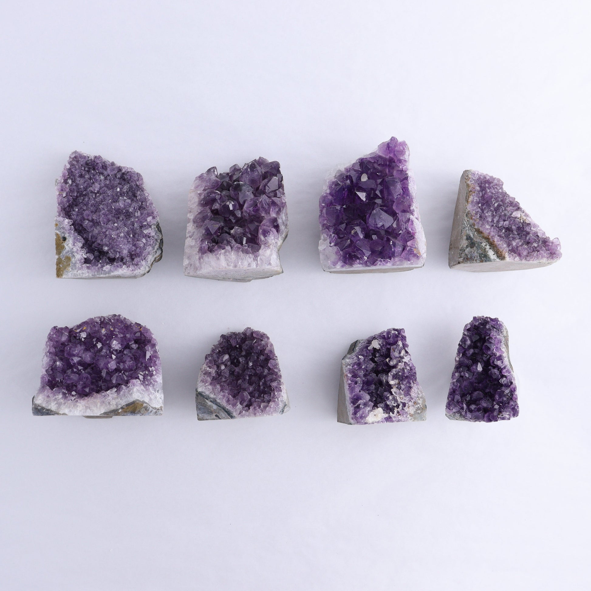 Uruguay Amethyst Cut Base Set of 8 - Expert Wholesale and Supplier of Wholesale Crystals & Bulk Gemstones, ["Amethyst","Cut Base","Uruguay"]