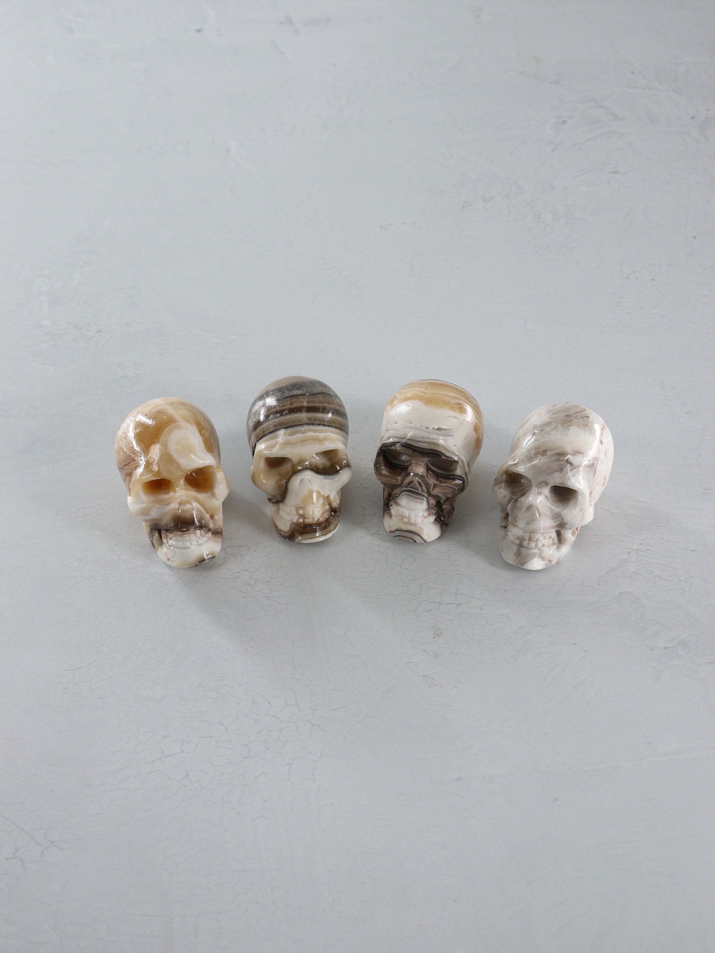 Onyx Skulls Set of 4 - Expert Wholesale and Supplier of Wholesale Crystals & Bulk Gemstones, []