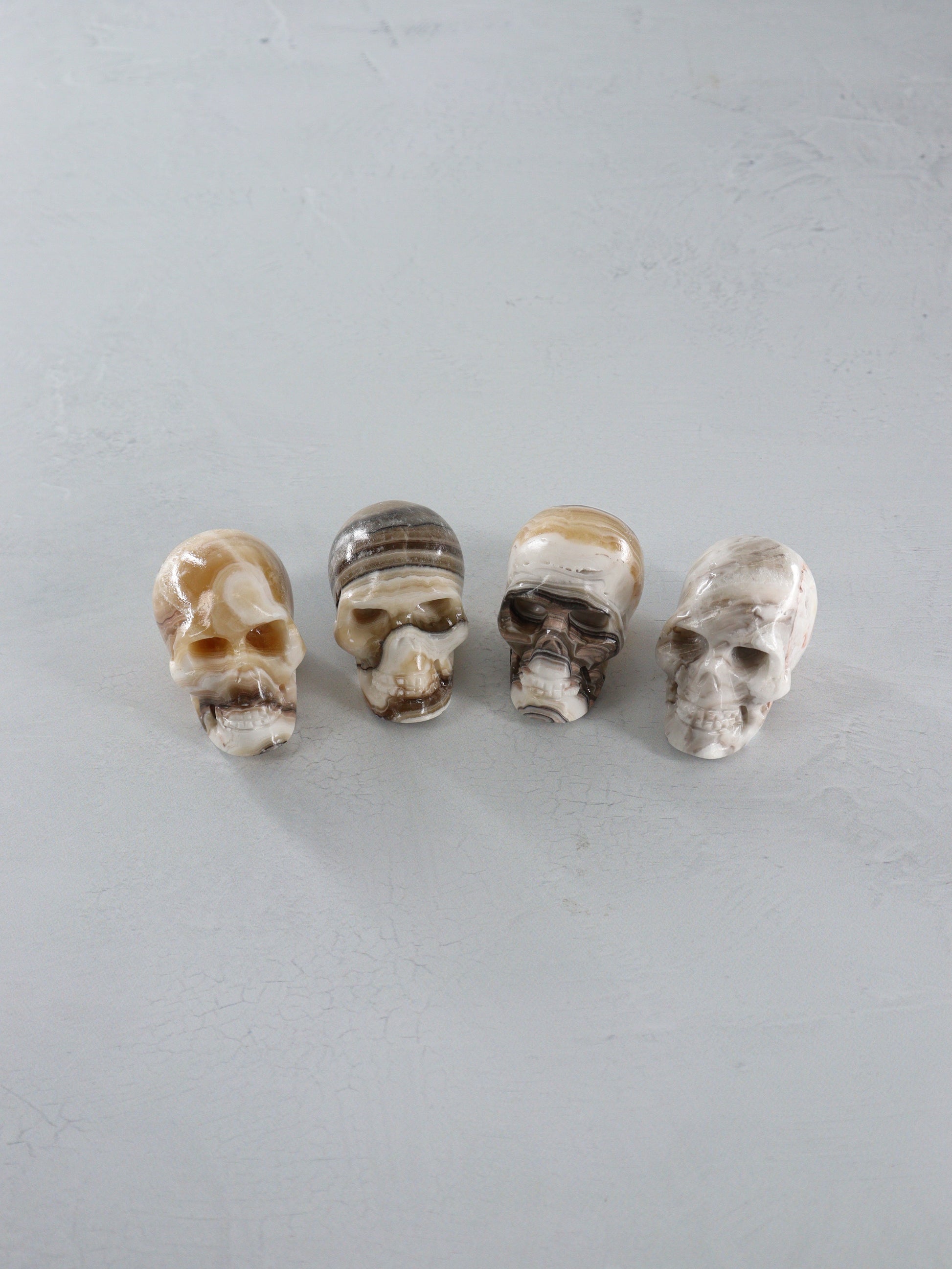Onyx Skulls Set of 4 - Expert Wholesale and Supplier of Wholesale Crystals & Bulk Gemstones, []