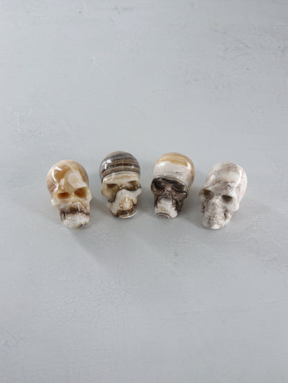Onyx Skulls Set of 4 - Expert Wholesale and Supplier of Wholesale Crystals & Bulk Gemstones, []