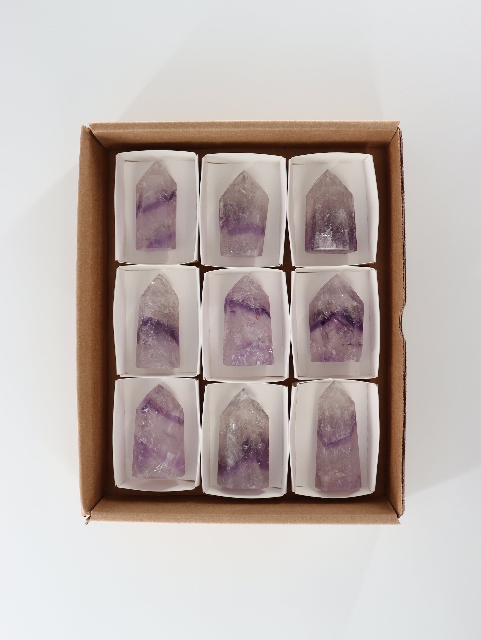 Phantom Amethyst Towers Set of 9 - Expert Wholesale and Supplier of Wholesale Crystals & Bulk Gemstones, []