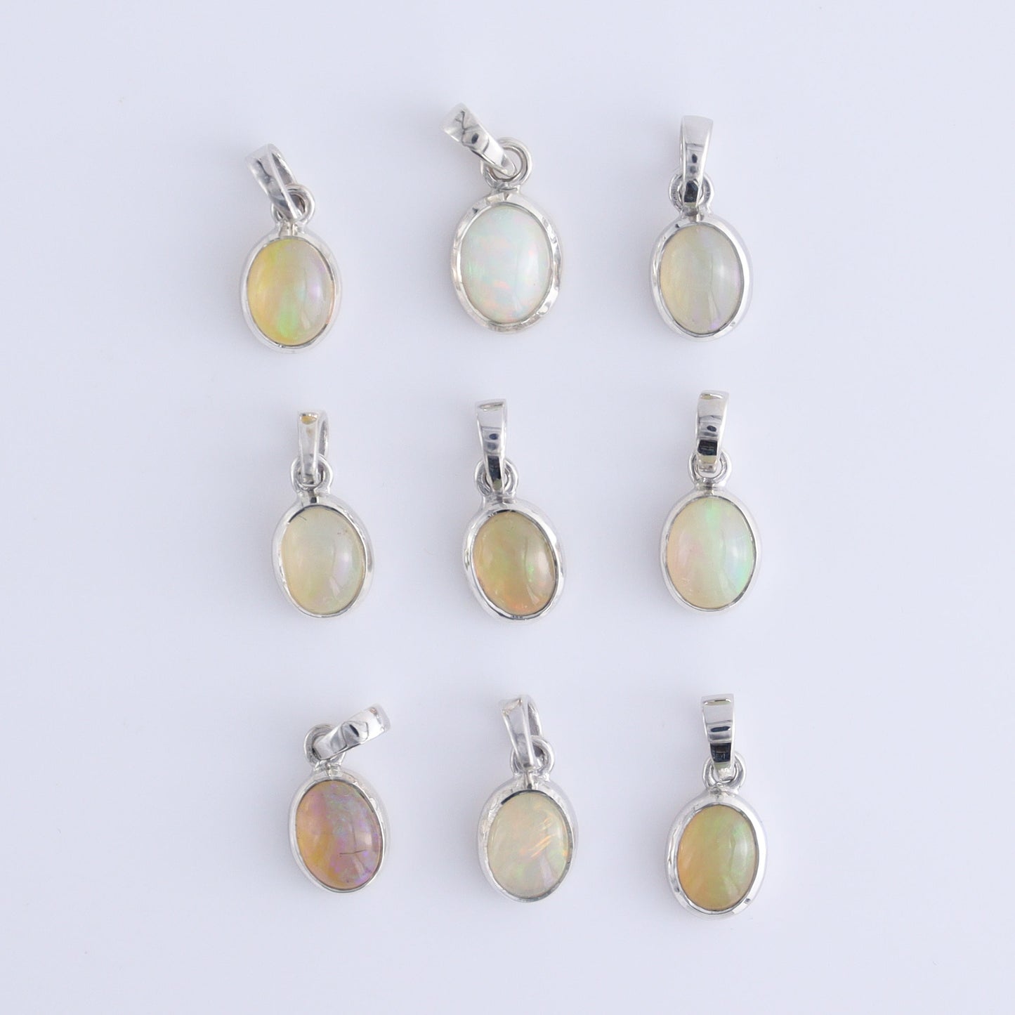 One Opal Sterling Silver Pendant (chain not included) - Expert Wholesale and Supplier of Wholesale Crystals & Bulk Gemstones, ["Opal","Pendant","sterling silver"]