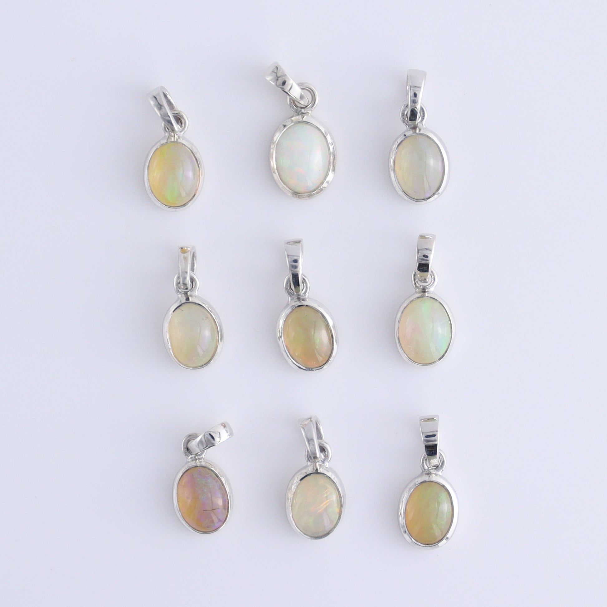 One Opal Sterling Silver Pendant (chain not included) - Expert Wholesale and Supplier of Wholesale Crystals & Bulk Gemstones, ["Opal","Pendant","sterling silver"]