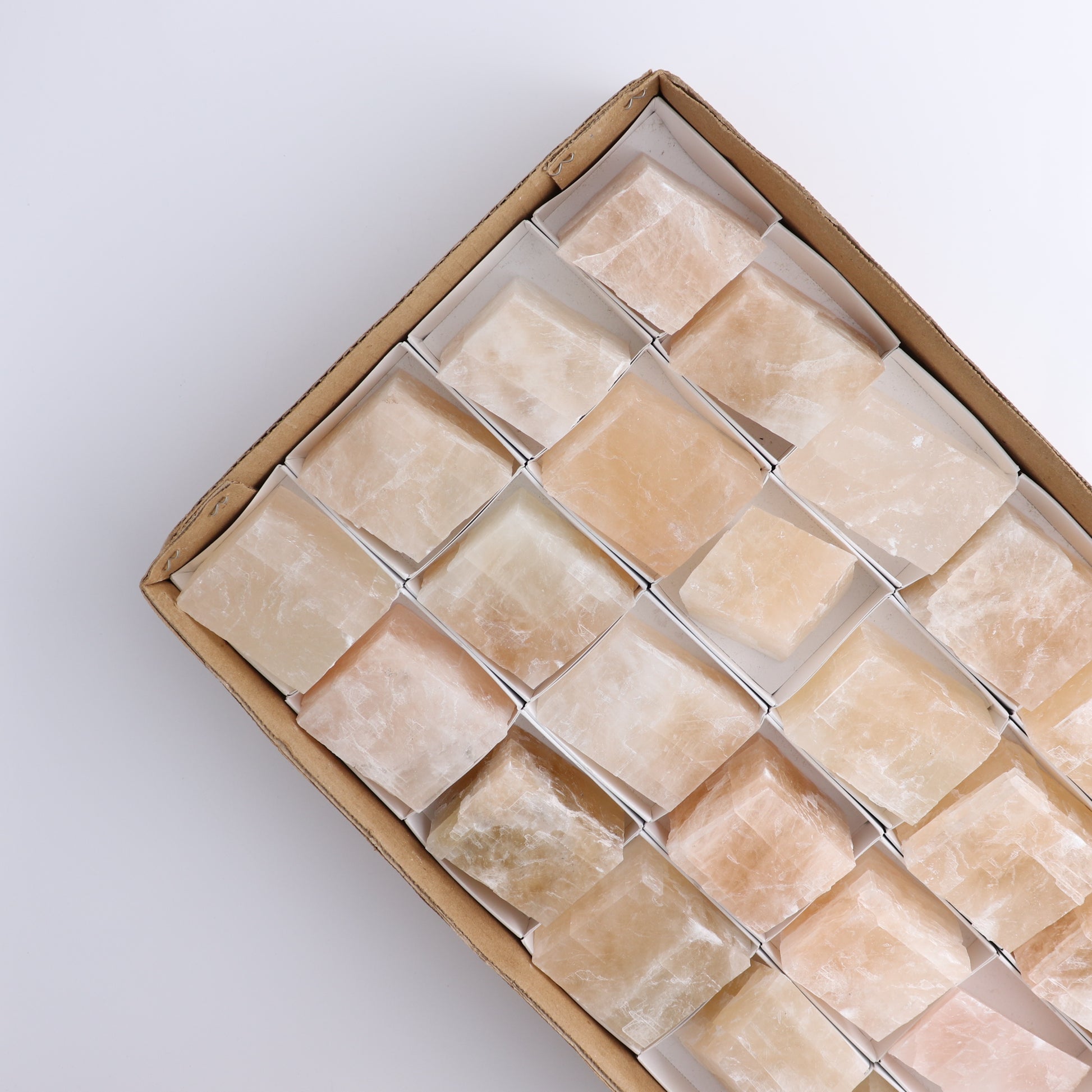 Pink Optical Calcite (Fluorescent) Set of 24 - Expert Wholesale and Supplier of Wholesale Crystals & Bulk Gemstones, ["Calcite","Mexico","Optical Calcite"]