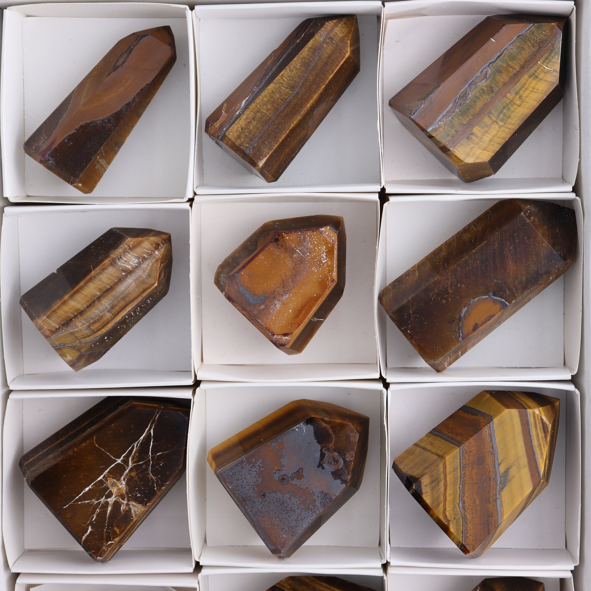 Tiger Eye Towers Set of 12 - Expert Wholesale and Supplier of Wholesale Crystals & Bulk Gemstones, ["Brazil","close_70","Tiger Eye","Towers"]