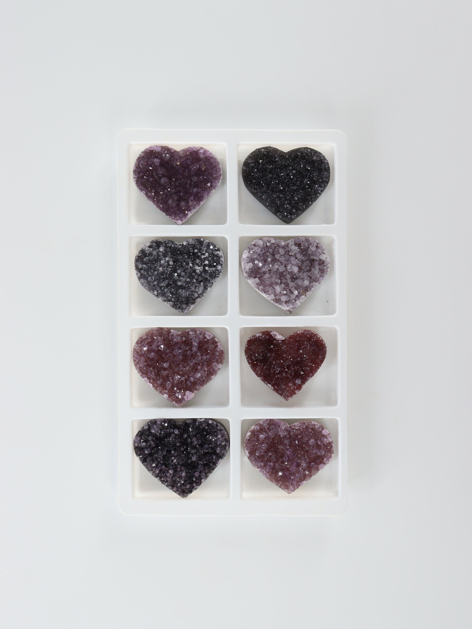 Amethyst Hearts Set of 8 - Expert Supplier of Wholesale Crystals & Bulk Gemstones