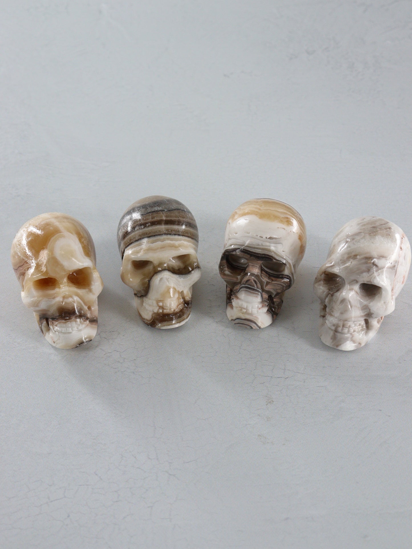 Onyx Skulls Set of 4 - Expert Wholesale and Supplier of Wholesale Crystals & Bulk Gemstones, []