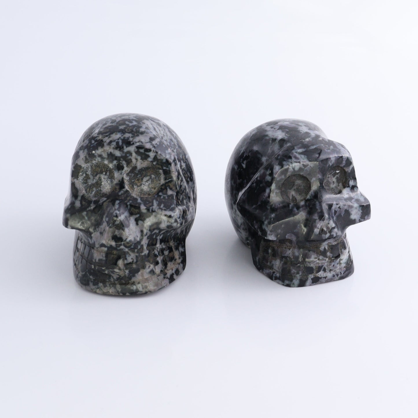 Indigo Gabbro Skulls Set of 2 - Expert Wholesale and Supplier of Wholesale Crystals & Bulk Gemstones, ["Indigo Gabbro","Madagascar","Skulls"]