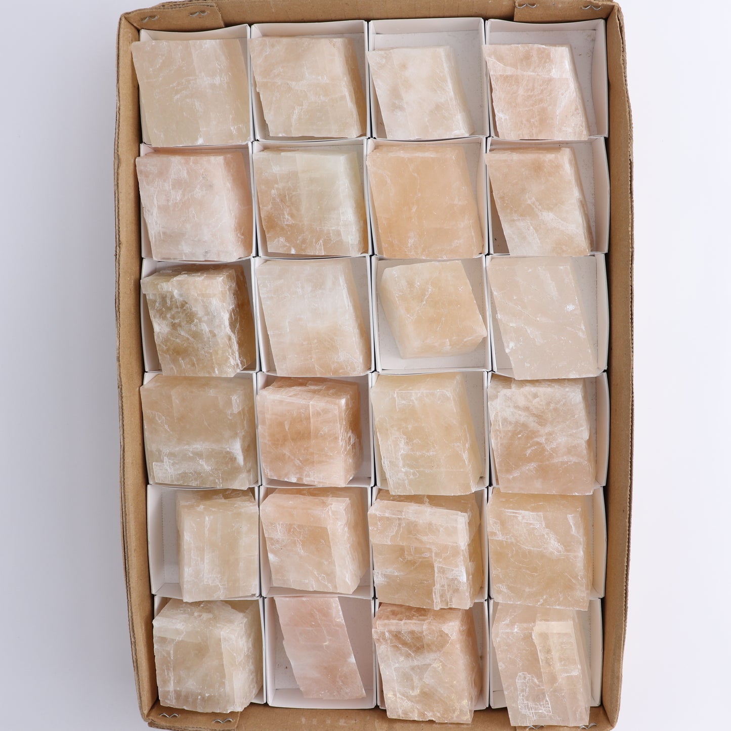 Pink Optical Calcite (Fluorescent) Set of 24 - Expert Wholesale and Supplier of Wholesale Crystals & Bulk Gemstones, ["Calcite","Mexico","Optical Calcite"]