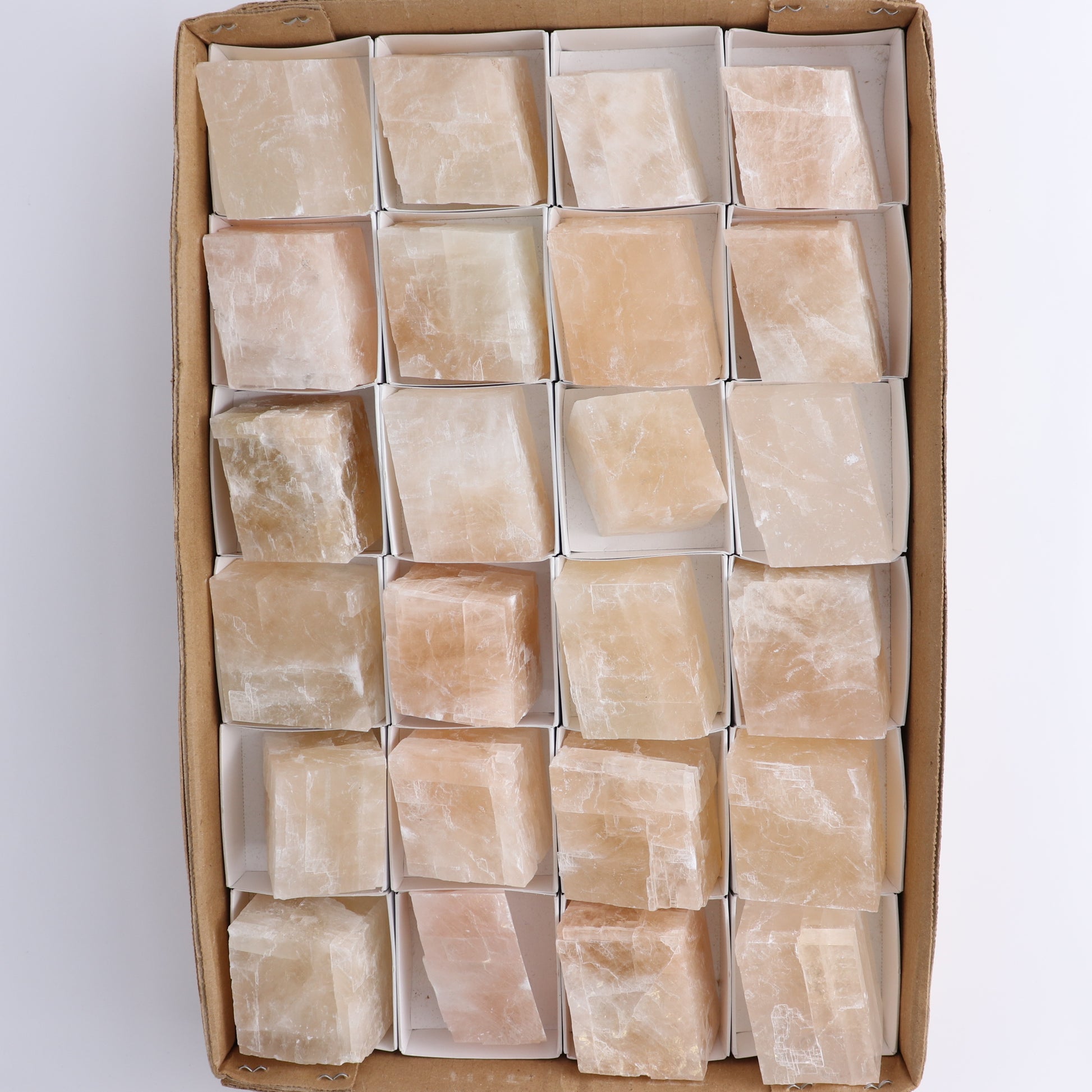 Pink Optical Calcite (Fluorescent) Set of 24 - Expert Wholesale and Supplier of Wholesale Crystals & Bulk Gemstones, ["Calcite","Mexico","Optical Calcite"]