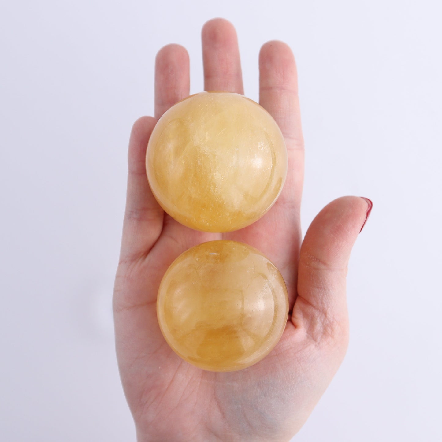 Calcite Spheres Set of 9 - Expert Wholesale and Supplier of Wholesale Crystals & Bulk Gemstones, ["Calcite","Mexico","Spheres"]