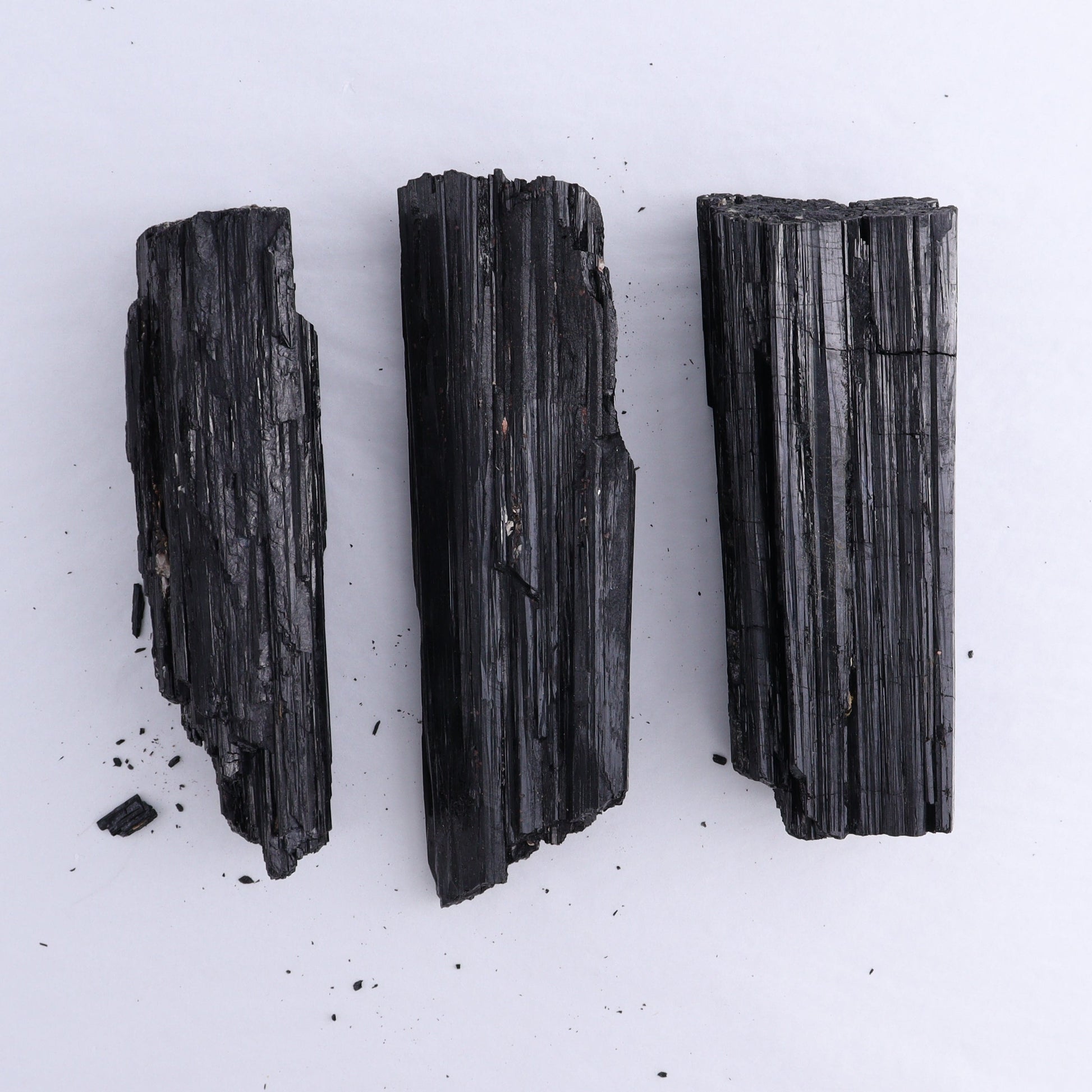 Black Tourmaline Log Set of 3 - Expert Wholesale and Supplier of Wholesale Crystals & Bulk Gemstones, ["Black Tourmaline","logs","Madagascar","Rough","Tourmaline"]