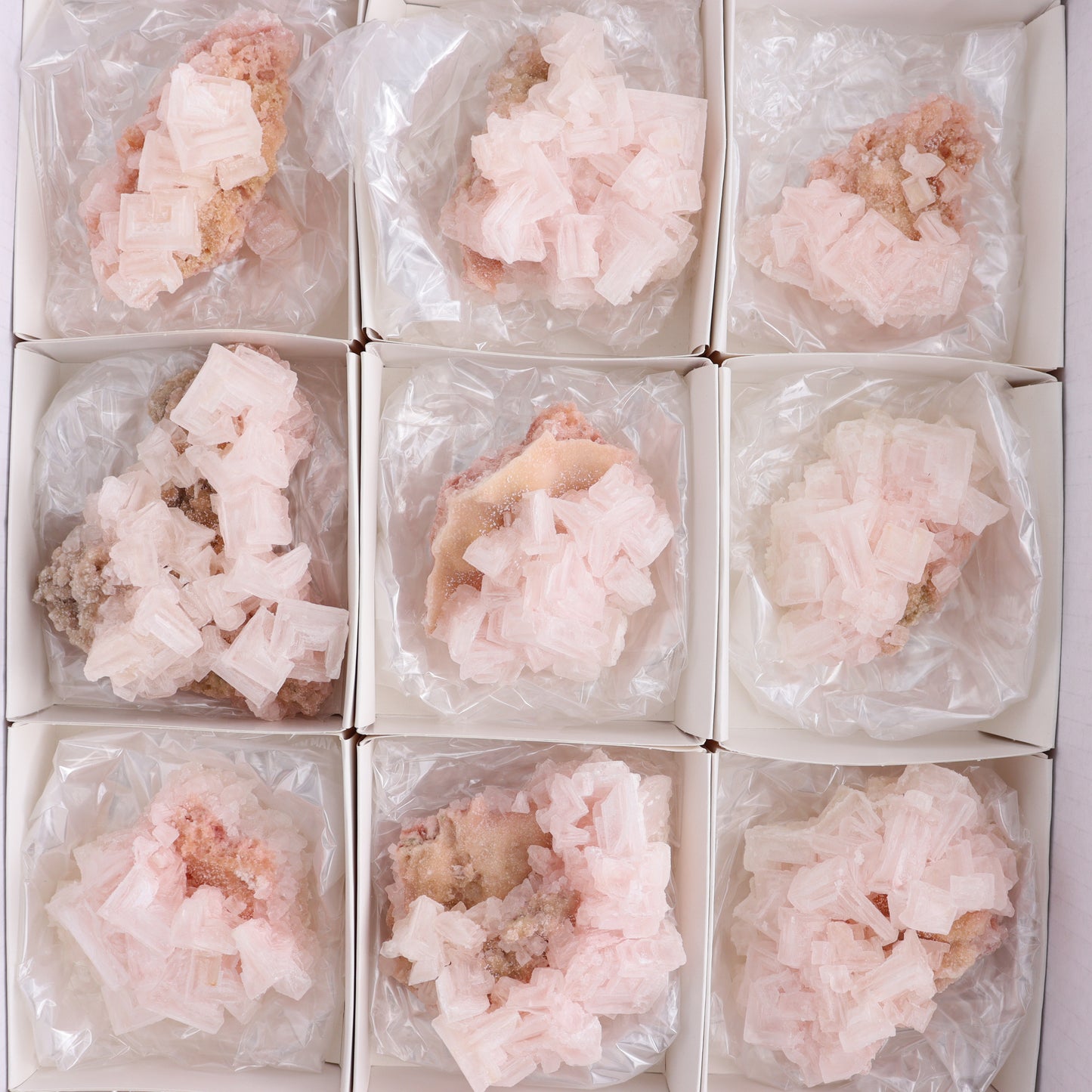 Searles Lake Halite Flat of 12 - Expert Wholesale and Supplier of Wholesale Crystals & Bulk Gemstones, ["close_30","Halite","Pink Halite","United States"]