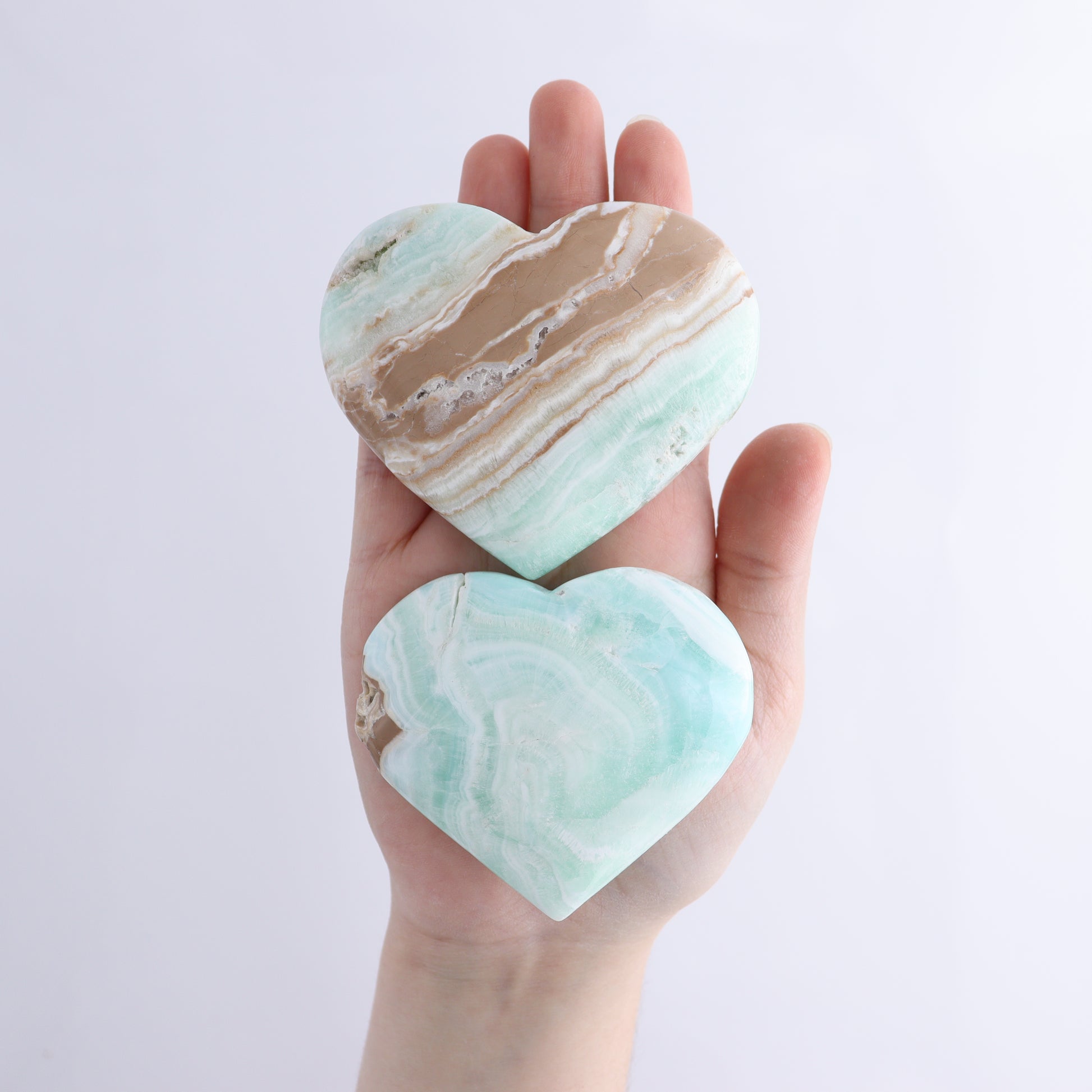 Caribbean Calcite Hearts Flat of 9 - Expert Wholesale and Supplier of Wholesale Crystals & Bulk Gemstones, ["Caribbean Calcite","Hearts","Madagascar"]
