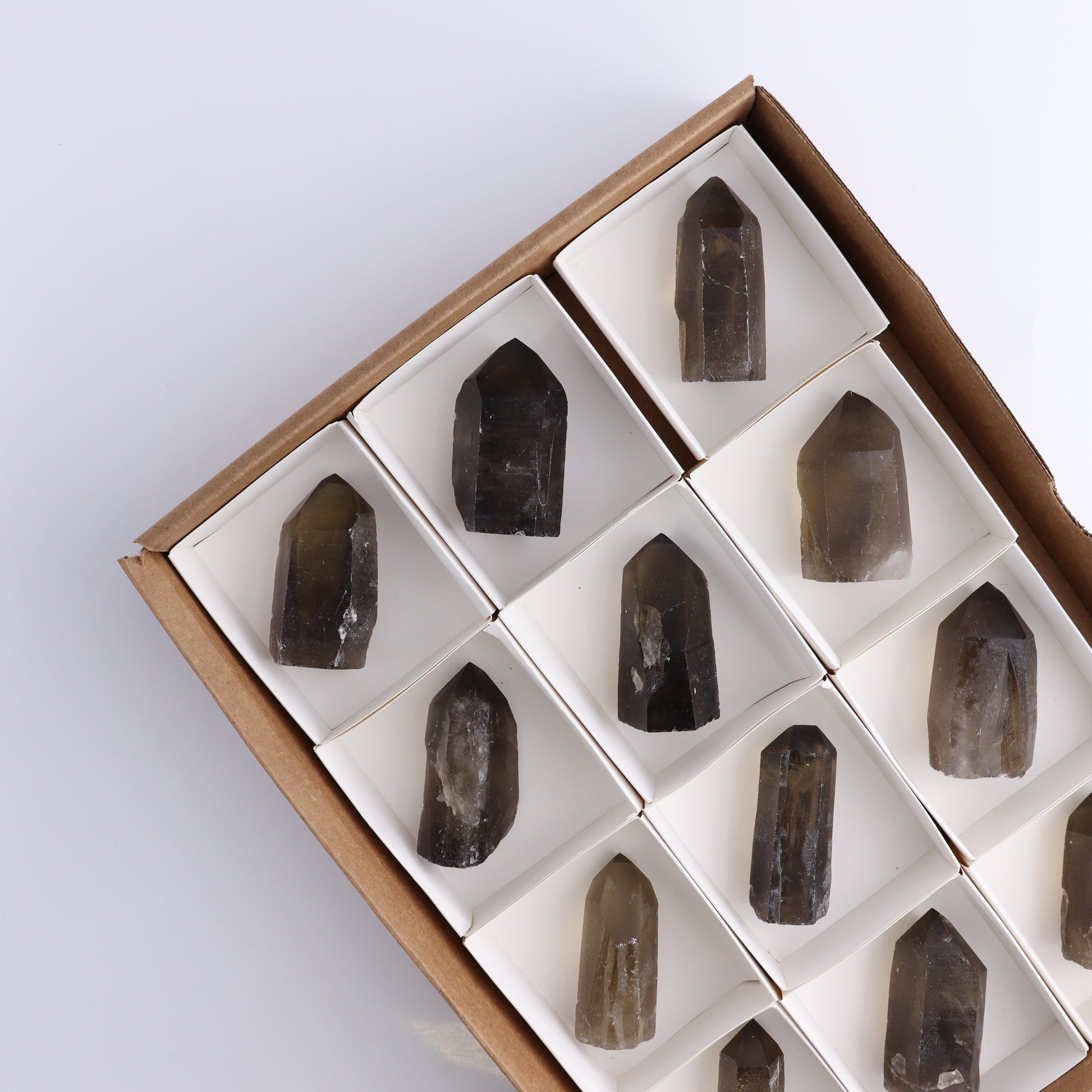 Smoky Quartz Polished Tops Set of 12 - Expert Wholesale and Supplier of Wholesale Crystals & Bulk Gemstones, ["Brazil","close_70","Points","Polished Tip","Quartz","Smoky Quartz"]