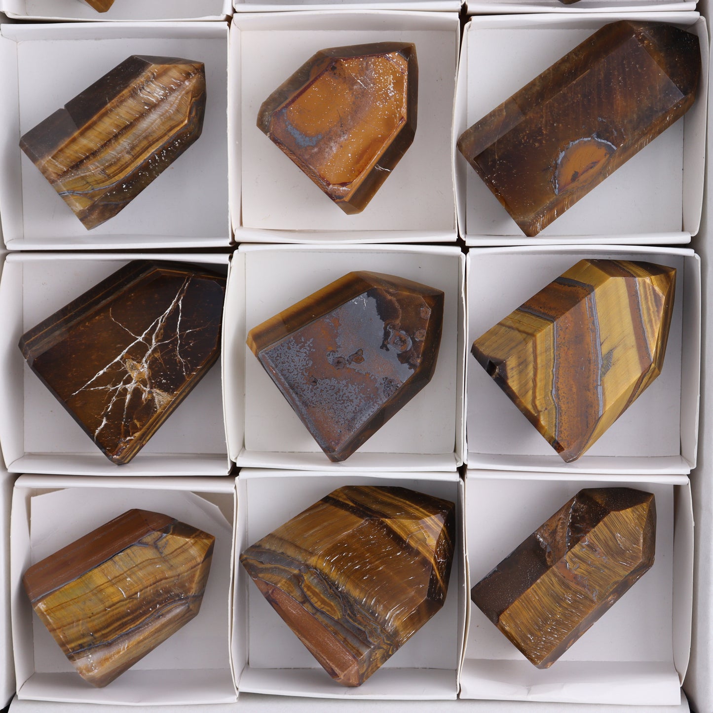 Tiger Eye Towers Set of 12 - Expert Wholesale and Supplier of Wholesale Crystals & Bulk Gemstones, ["Brazil","close_70","Tiger Eye","Towers"]