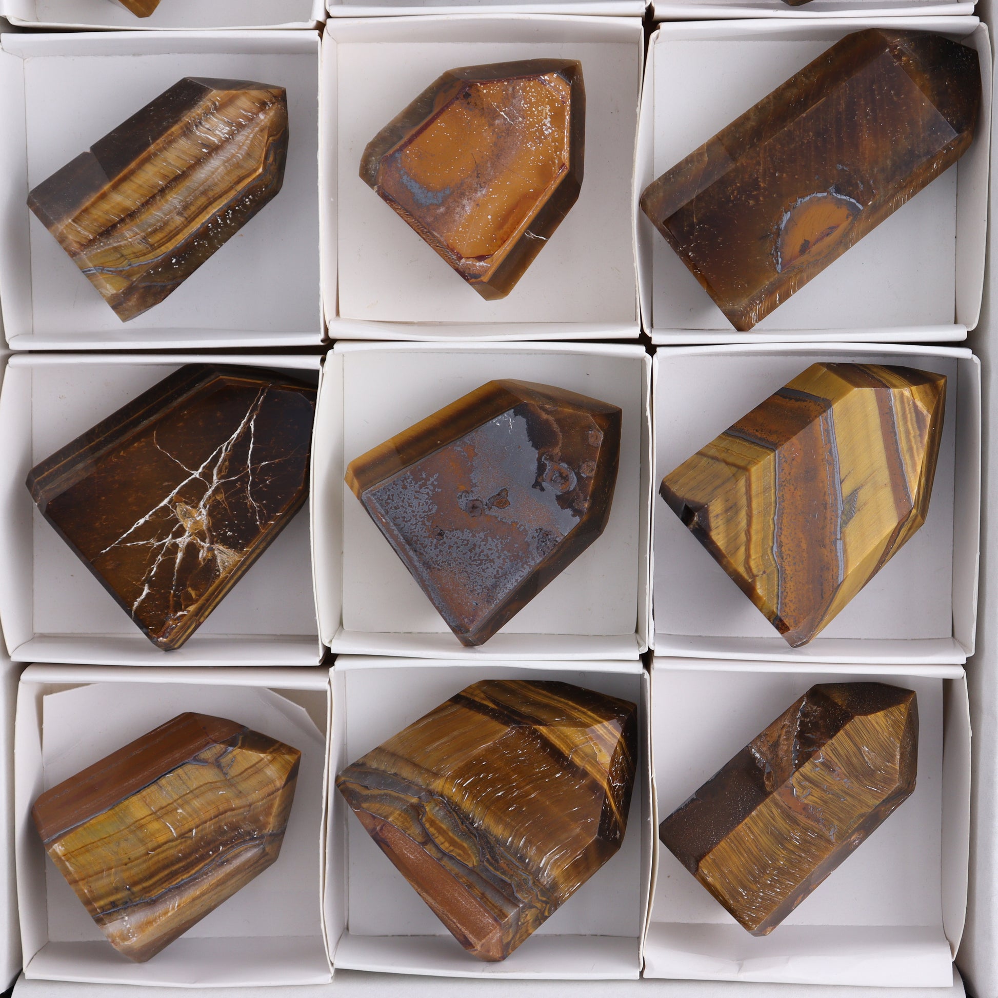 Tiger Eye Towers Set of 12 - Expert Wholesale and Supplier of Wholesale Crystals & Bulk Gemstones, ["Brazil","close_70","Tiger Eye","Towers"]