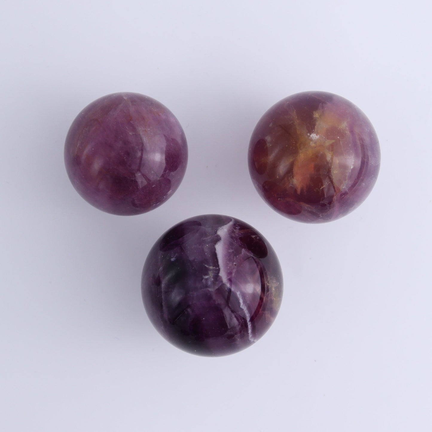 Purple Fluorite Spheres Set of 9 - Expert Wholesale and Supplier of Wholesale Crystals & Bulk Gemstones, ["Fluorite","Purple Fluorite","Spheres"]