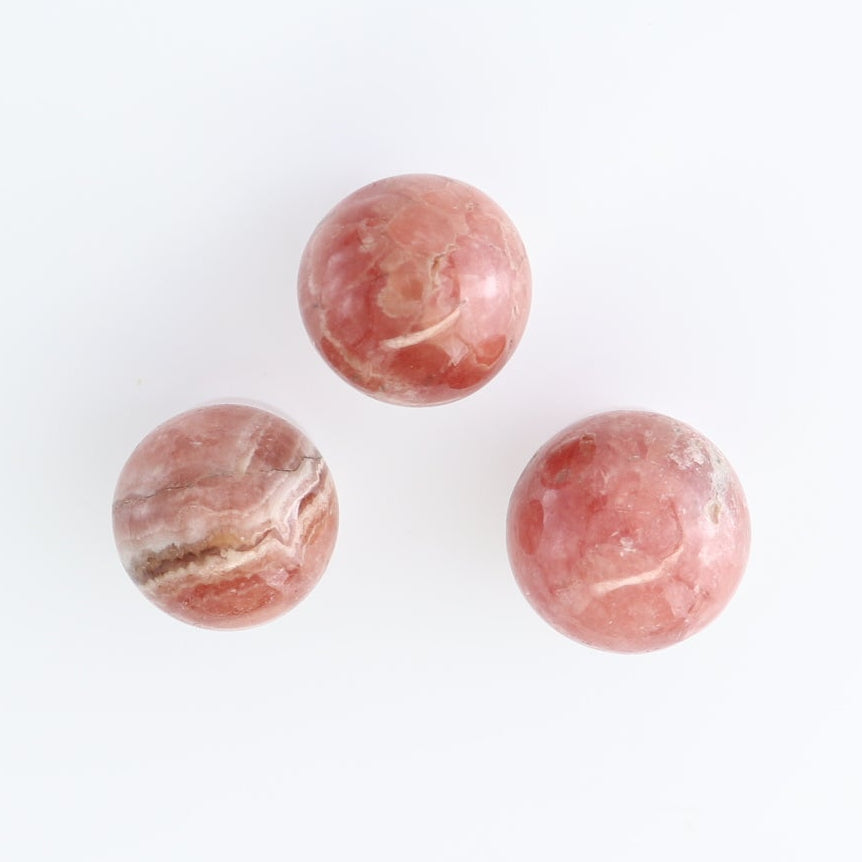 Rhodochrosite Spheres Set of 10 | Mi Esperanza Minerals | Supplier of Crystals and Onyx
