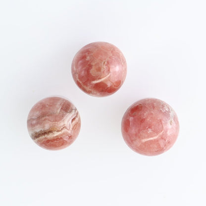 Rhodochrosite Spheres Set of 10 | Mi Esperanza Minerals | Supplier of Crystals and Onyx