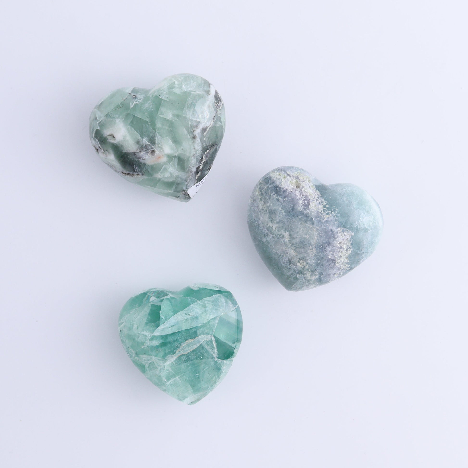 Fluorite Hearts Set of 7 - Expert Wholesale and Supplier of Wholesale Crystals & Bulk Gemstones, ["Fluorite","Hearts","Mexico"]