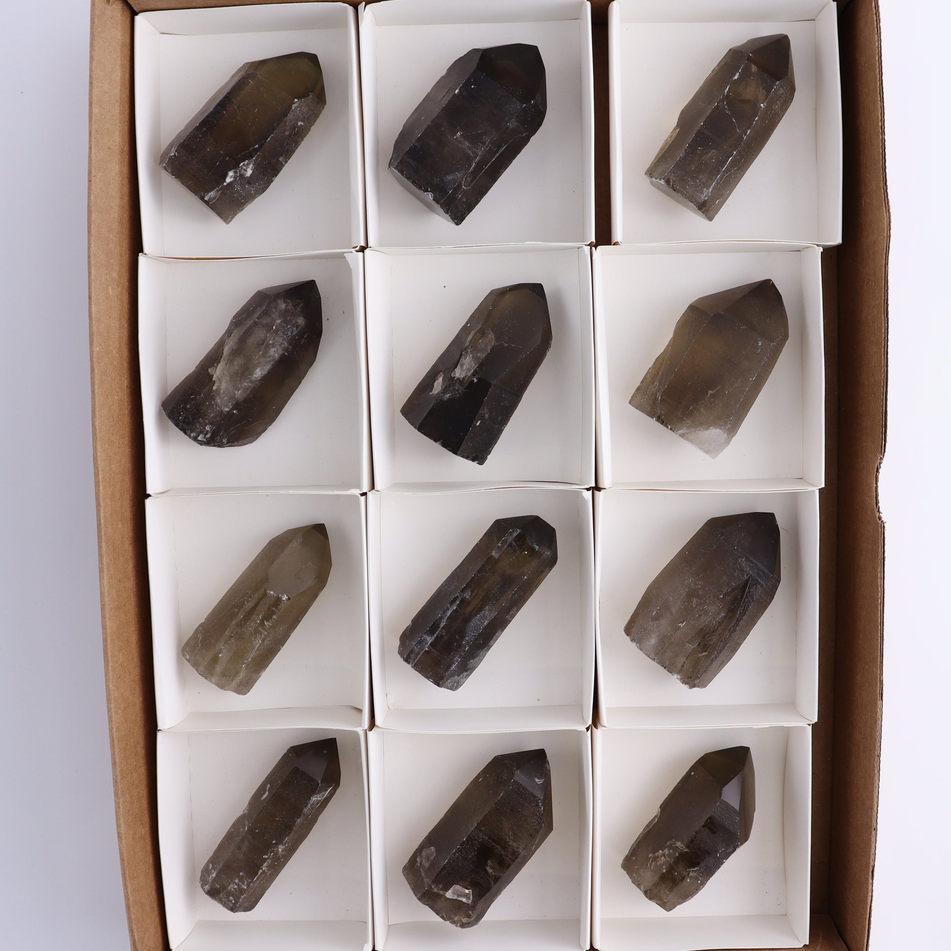 Smoky Quartz Polished Tops Set of 12 - Expert Wholesale and Supplier of Wholesale Crystals & Bulk Gemstones, ["Brazil","close_70","Points","Polished Tip","Quartz","Smoky Quartz"]